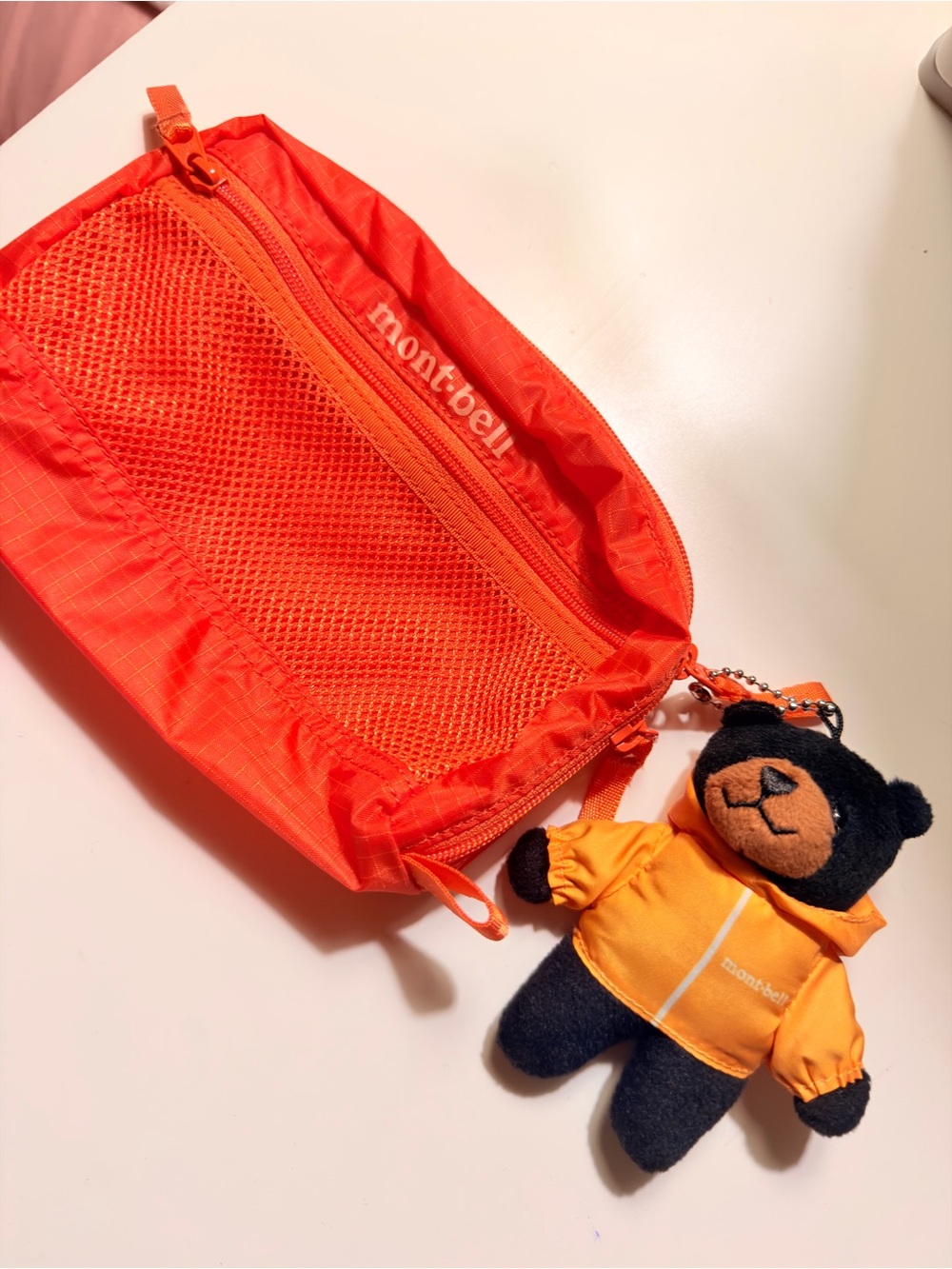 Japan Mont-bell orange mesh cosmetic bag with teddy bear charm